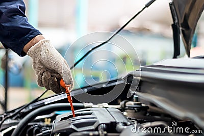 People Regular car care makes car use Such as oil inspection Stock Photo