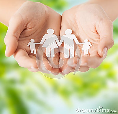 Female hands with paper family pictogram Stock Photo