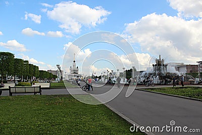 People relax in the Fountain Stone Flower at the VDNKh Editorial Stock Photo