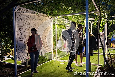 People relaxing in a special chilling natural area decorated wit Editorial Stock Photo