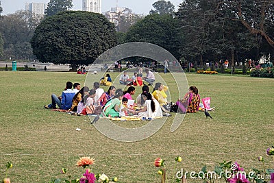 People relaxing in the Victoria Memorial gardens in Kolkata Editorial Stock Photo