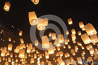 People release Khom Loi, the sky lanterns during Yi Peng or Loi Krathong festival Editorial Stock Photo