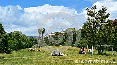 People resting at Parc de la Ciutadella in Barcelona, Spain Editorial Stock Photo