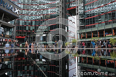 People are resting by the pool inside Sony Center Editorial Stock Photo