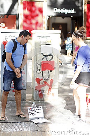 People reunited on Barcelona`s Rambla after terrorist atack. Editorial Stock Photo