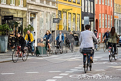 People riding bicycles Copenhagen old town, Denmark. Street style Editorial Stock Photo