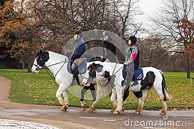 People riding horses in Hyde Park Editorial Stock Photo