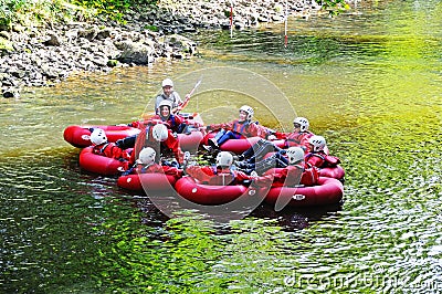 People in rubber canoes, Matlock Bath. Editorial Stock Photo