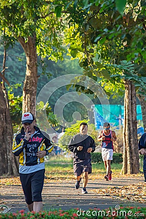 The people running exercise for health in the BangYai park , Non Editorial Stock Photo