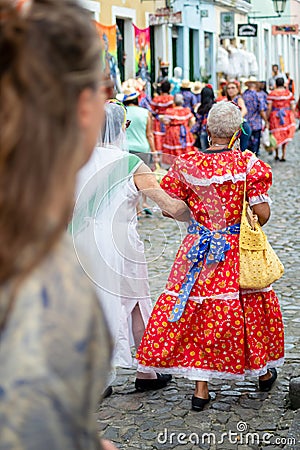 People are seen in the streets of Pelourinho dressed in costume for the feast of Sao Joao Editorial Stock Photo