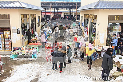 People selling and buying in a local chinese market Editorial Stock Photo