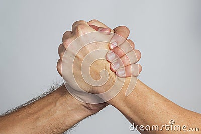 People are shaking hands. Friendly handshake, friends greeting, teamwork, friendship Stock Photo