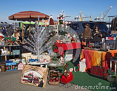 People shopping at a flea market before Christmas Editorial Stock Photo