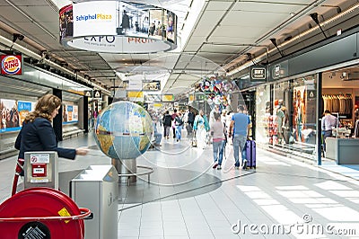 People shopping at Schiphol plaza Editorial Stock Photo