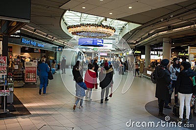 People shopping at Schiphol plaza Editorial Stock Photo