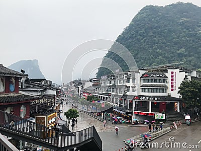 People on shopping West Street in Yangshuo town Editorial Stock Photo