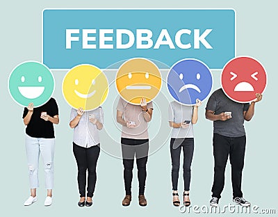 People showing customer feedback evaluation emoticons Stock Photo