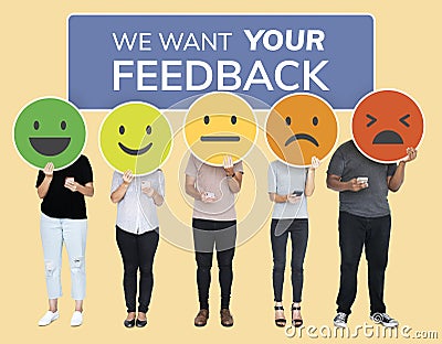 People showing customer feedback evaluation emoticons Stock Photo