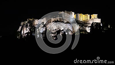 People silhouettes in the foreground, with Acropolis night view at the background Editorial Stock Photo