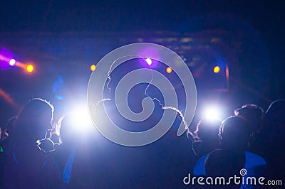 people silhouettes in nightclub with lights Editorial Stock Photo