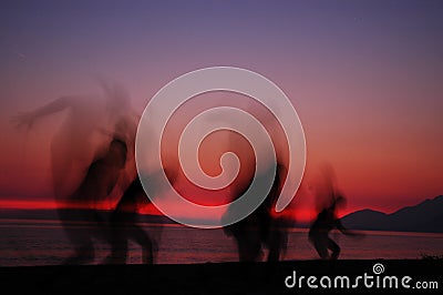 People silhouettes in sunset Stock Photo
