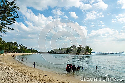 People at Siloso Beach at Sentosa island in Singapore. Editorial Stock Photo