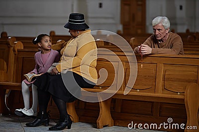 People sitting in church during ministration Stock Photo