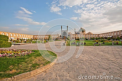 People sitting and relaxing on the green grass of famouse Imam Square Editorial Stock Photo