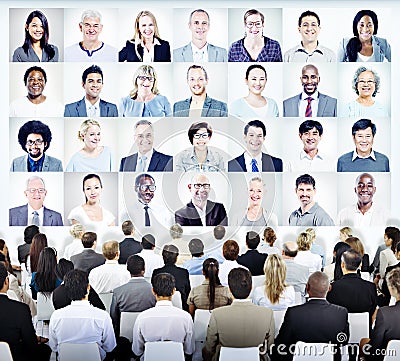 People Sitting with Set of Business People's Faces Stock Photo