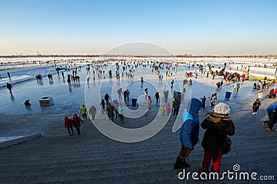 The people of skating in Harbin Songhua river Editorial Stock Photo
