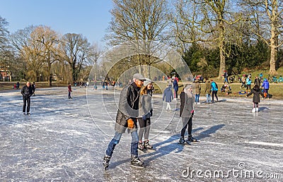 People skating in the park in Groningen Editorial Stock Photo