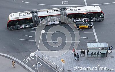 People stand on a bus stop in Barcelona Editorial Stock Photo