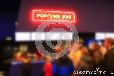 People stand in line for popcorn Stock Photo