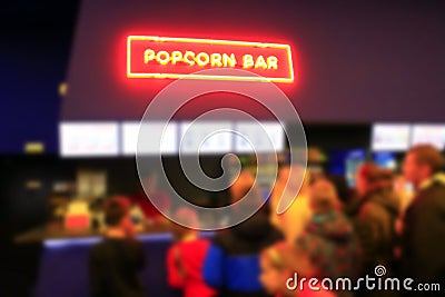 People stand in line for popcorn Stock Photo