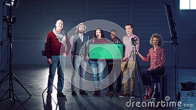 People standing with chromakey board Stock Photo