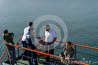 People standing on the ship. Passengers on ferry boat headed to sabang island. KMP BRR Editorial Stock Photo