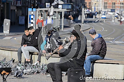 People Stay To Close At The Dam Square During The Coronavirus Outbreak At Amsterdam The Netherlands 2020 Editorial Stock Photo