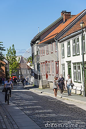 People stone paved street Bakklandet Editorial Stock Photo