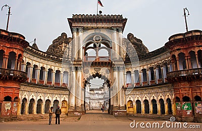 People stopped past historic indian gates with arches in ancient city Editorial Stock Photo