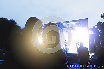 People at a street concert in the evening Editorial Stock Photo
