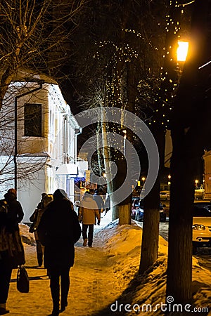 people on street in Suzdal town in winter evening Editorial Stock Photo