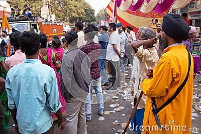 People in the street watching Guru Nanak Gurpurab celebration in Editorial Stock Photo