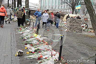 People on street, which is covered with flowers Editorial Stock Photo