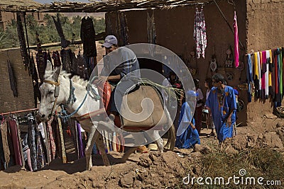 People on the streets in Kasbah Ait Ben Haddou in the Atlas Mountains, Morocco. Editorial Stock Photo
