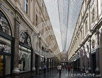People strolling through the Galeries Royales Saint-Hubert shopping arcades Editorial Stock Photo