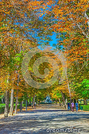 People are strolling through Parque del Buen Retiro in Madrid, Spain Editorial Stock Photo