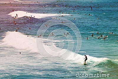 People surfing at the crowded Bondi beach in Sydney, Australia Editorial Stock Photo