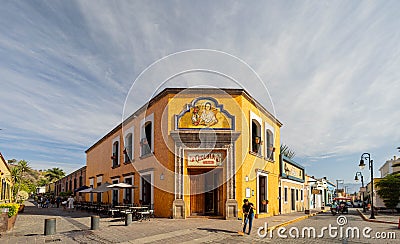 People sweeping in front of the Restaurante La Fonda Cholula Editorial Stock Photo