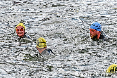 People swim at Challenge London Editorial Stock Photo