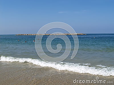 People swim in the Mediterranean Sea. The city beach in Tel Aviv. Israel Editorial Stock Photo